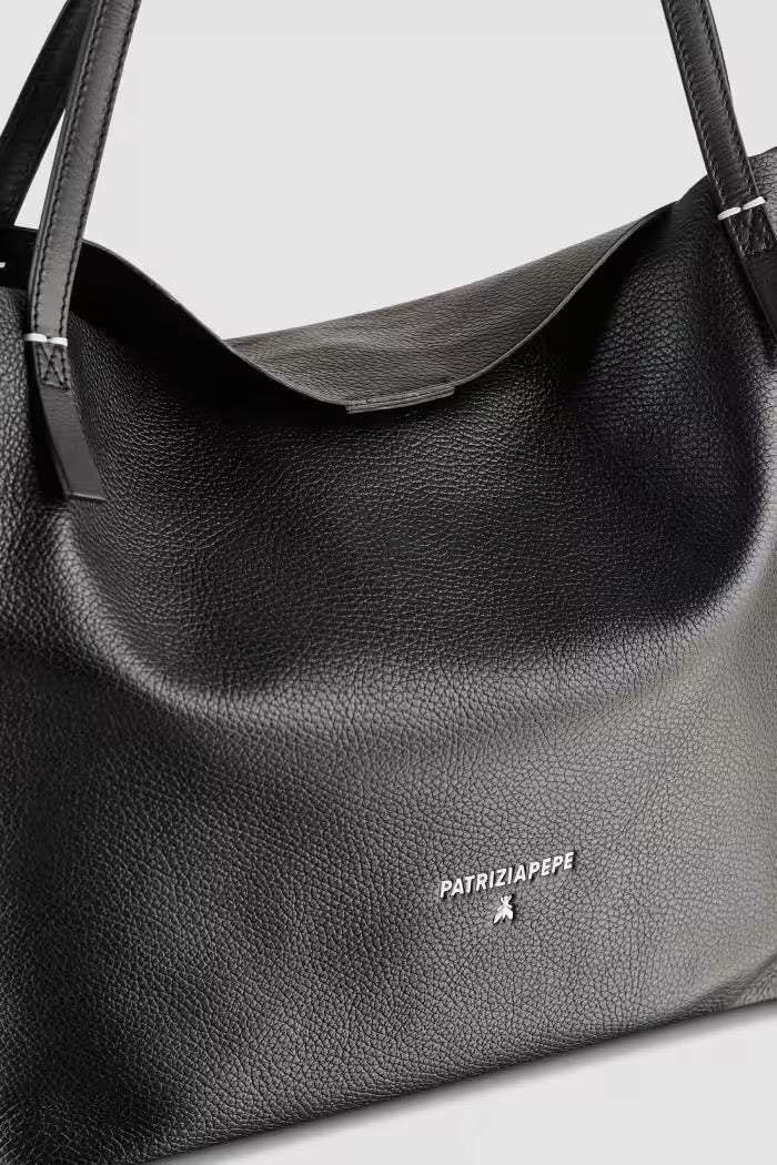 Borsa shopping Never Complete in pelle martellata